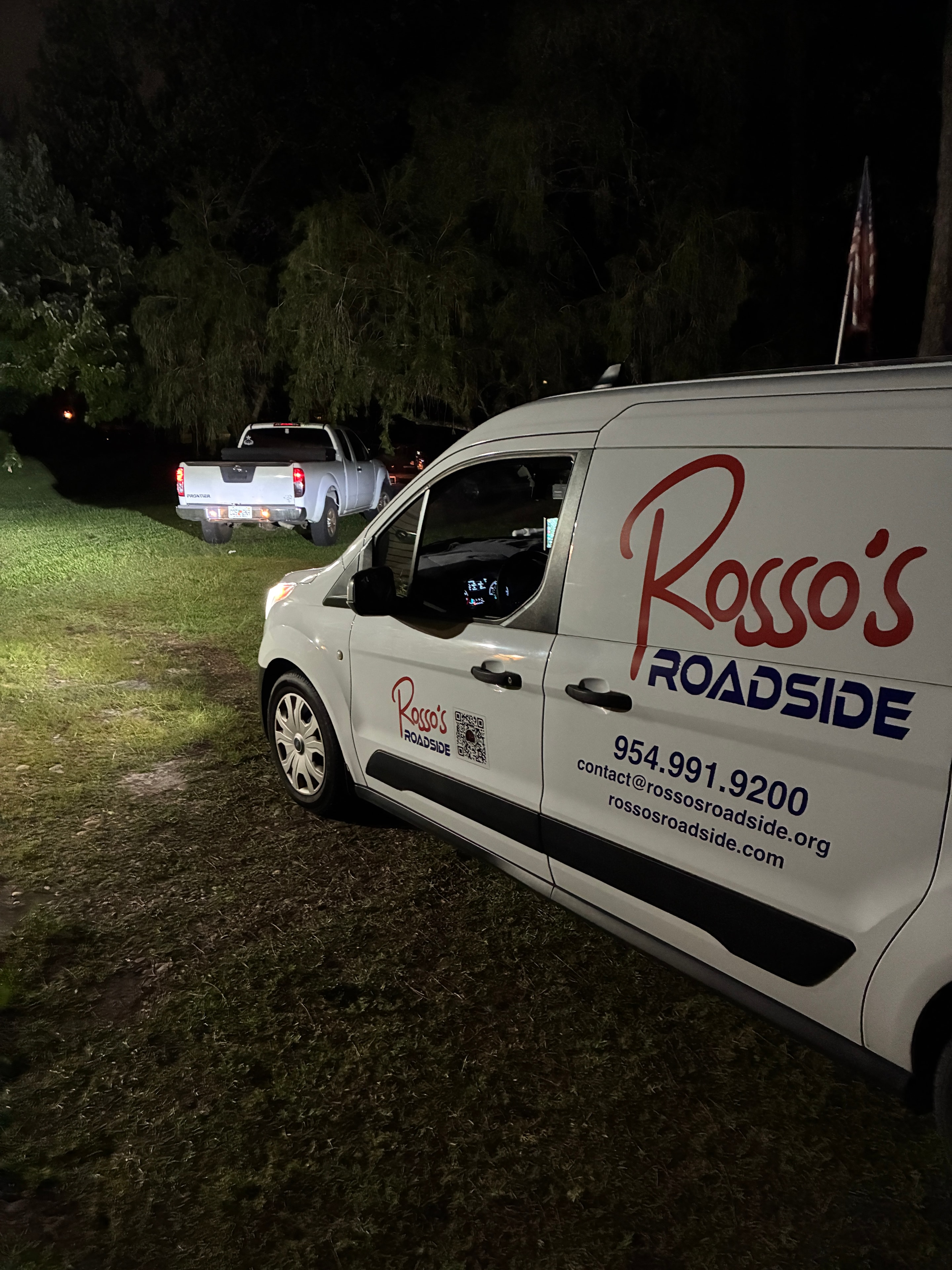 Rosso's Roadside service van at night