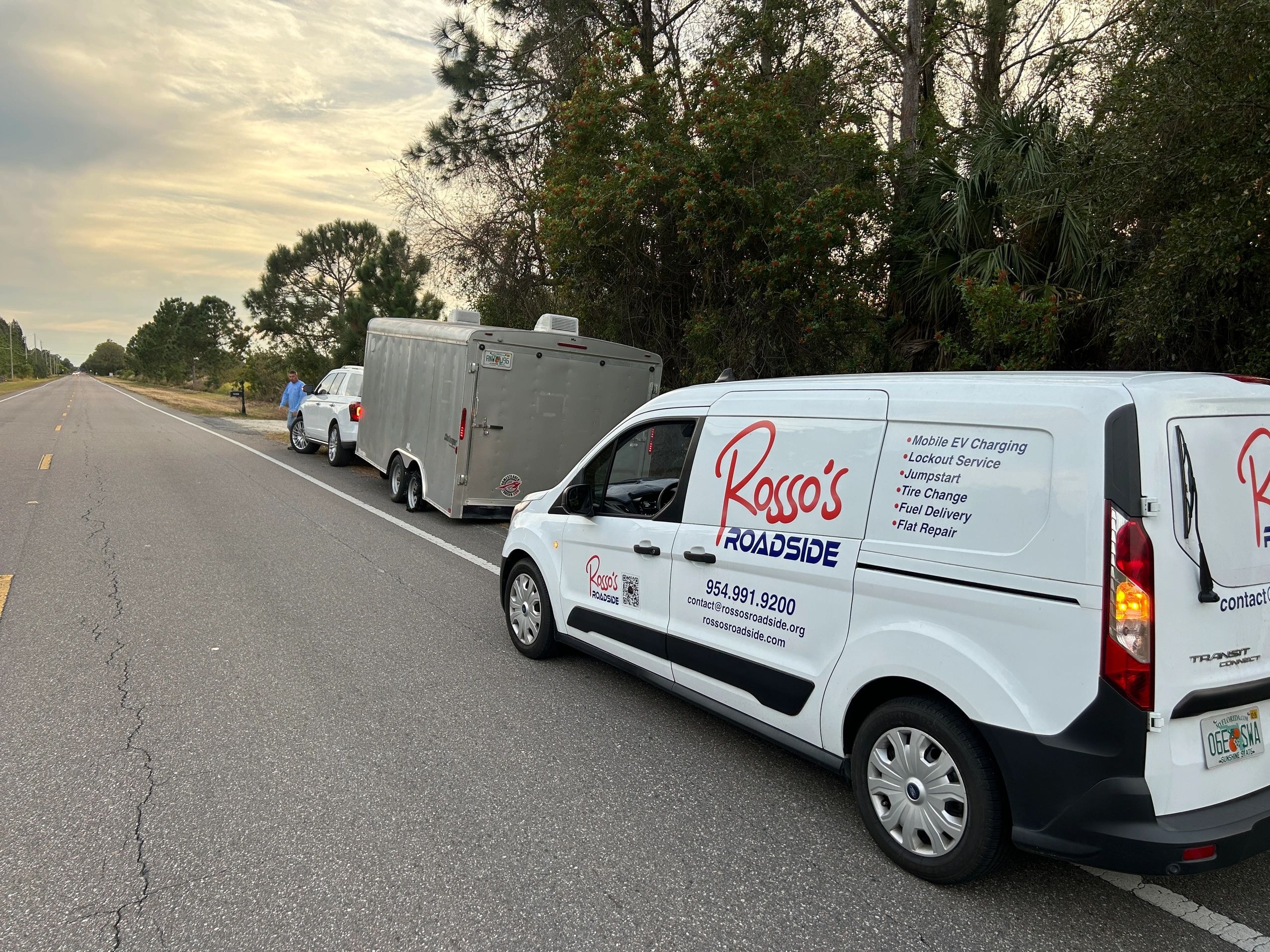 Rosso's Roadside service vehicles parked on highway